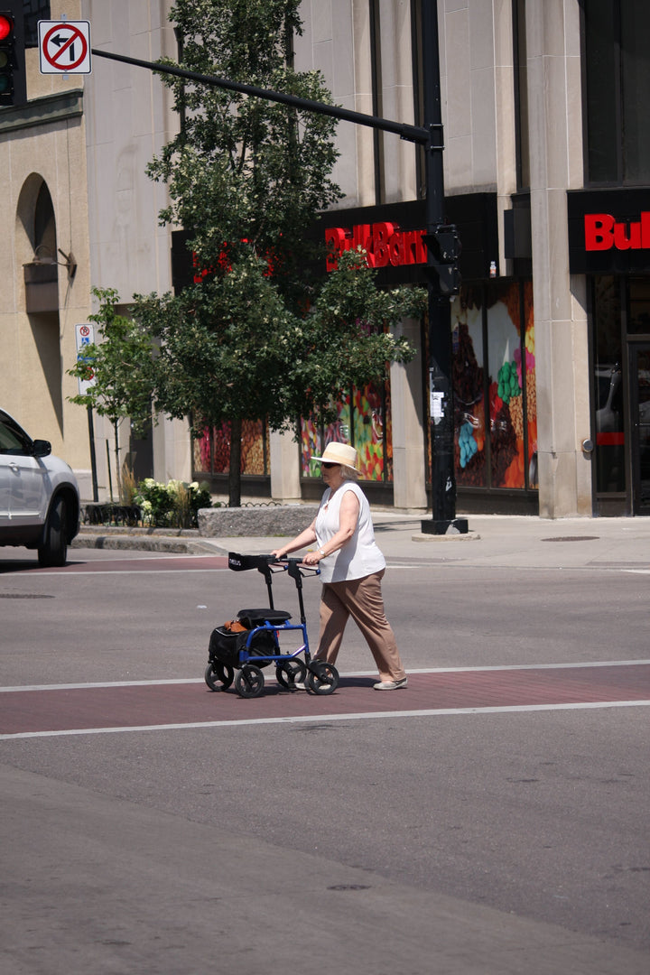 Older adult using a wheeled walker
