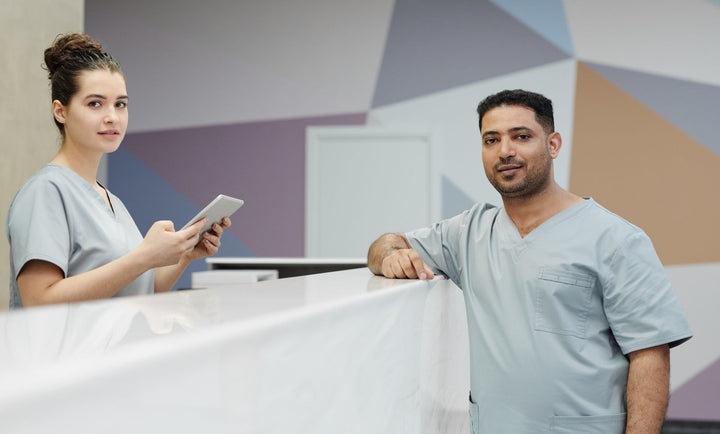 Medical staff at a modern clinic reception and nurses' station