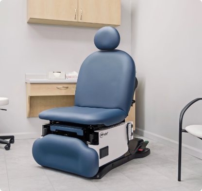4011 Leg-Centric Procedure Chairs - in exam room, blue upholstery