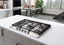 30" wide 5-burner gas cooktop made in Italy in stainless steel with sealed dual flame burner, cast iron grates, and wok