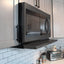 24" wide over-the-range microwave with hood in black