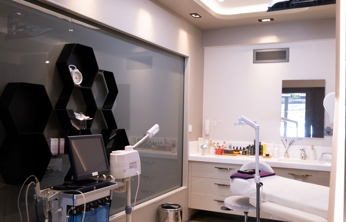 Modern med spa aesthetic clinic room with treatment devices
