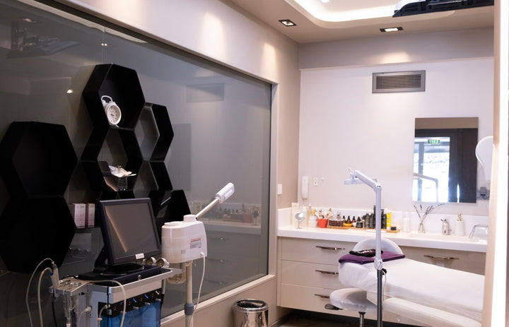 Modern med spa aesthetic clinic room with treatment devices