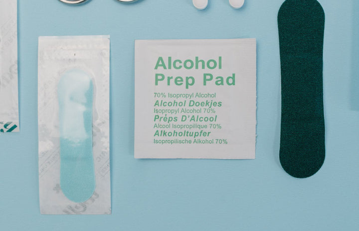 Wound care supplies: gauze, scissors and alcohol prep pads