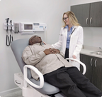4070 Manual Back Exam Chairs - patient reclined, in use