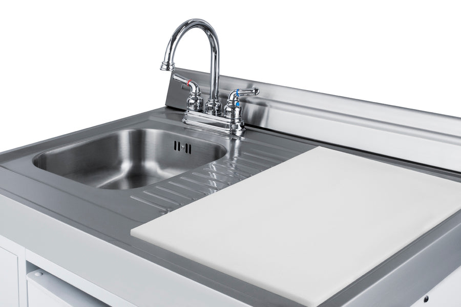 All-in-one combination kitchenette with refrigerator-freezer, sink, storage cabinet, and coil range (Model ACK60COILW)