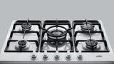 Accucold 5-burner gas cooktop made in Italy in a white finish with sealed burners, cast iron grates, and wok stand; fits standard