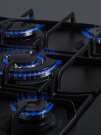 Accucold 5-burner gas cooktop made in Italy in black matte finish with sealed burners, cast iron grates, wok stand, and stainless