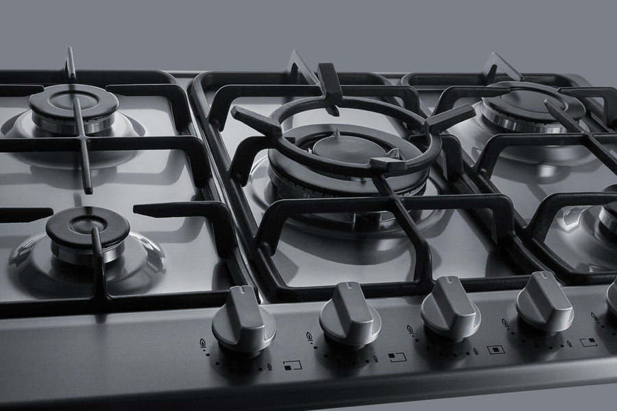 5-burner gas cooktop made in Italy in a stainless steel finish with sealed burners, cast iron grates, and wok stand; fit