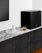 Accucold Compact solid door minibar in black with front lock (Model MB41B)