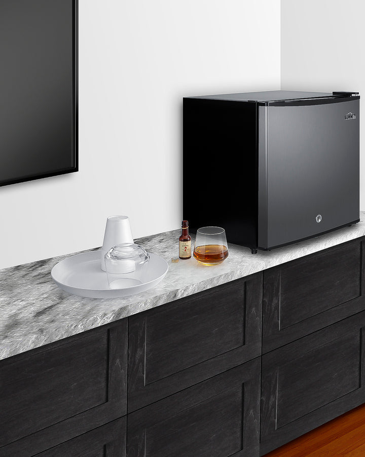 Compact minibar with stainless steel door and front lock