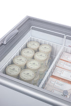 Flat top commercial ice cream freezer with sliding glass lid, digital thermostat, novelty baskets, and 16.6 cu.ft. capac - Baskets