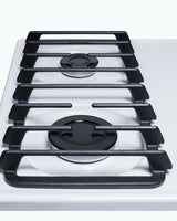 Accucold 24" wide gas cooktop with four sealed burners, white porcelain surface, and cast iron grates; made in the USA