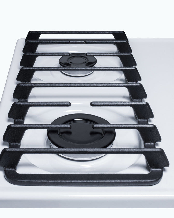 Accucold 24" wide gas cooktop with four sealed burners, white porcelain surface, and cast iron grates; made in the USA