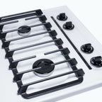 Accucold 24" wide gas cooktop with four sealed burners, white porcelain surface, and cast iron grates; made in the USA