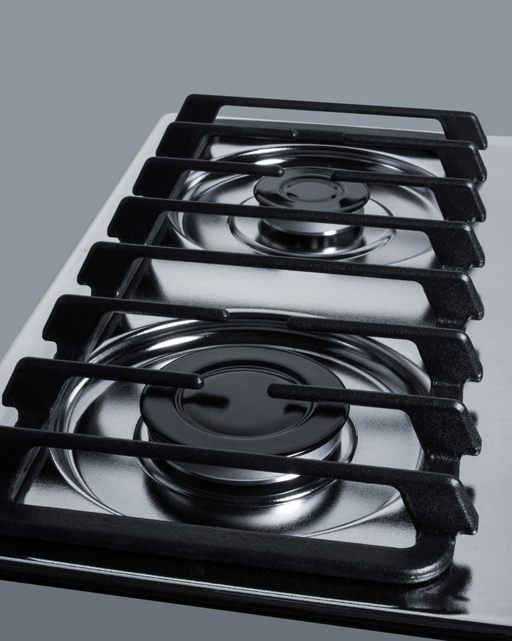 Accucold 24" wide gas cooktop with four sealed burners, chrome surface, and cast iron grates; made in the USA