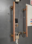 Two full-length pipe style handles in copper factory installed on any two-door refrigeration unit