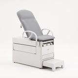 Brewer Versa medical exam table with seamless upholstered top and pass-through side drawer